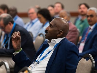 SLC 2026 Conference attendee speaking during a session